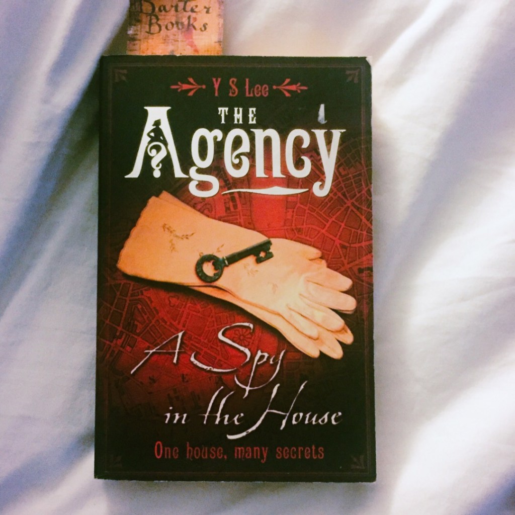 Paperback copy of the Agency