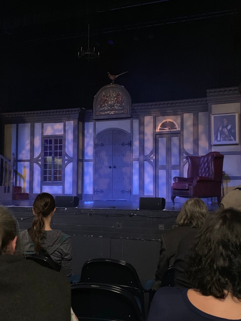 Set of a country house featuring a lift door and pheasants
