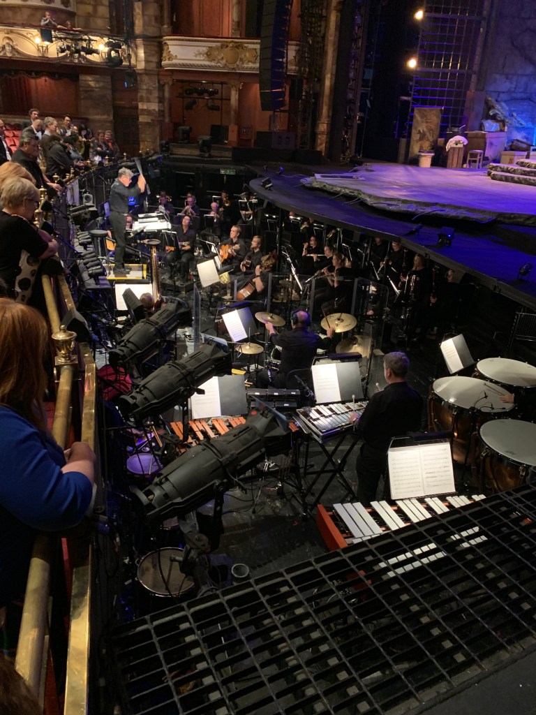 Orchestra playing in an orchestra pit