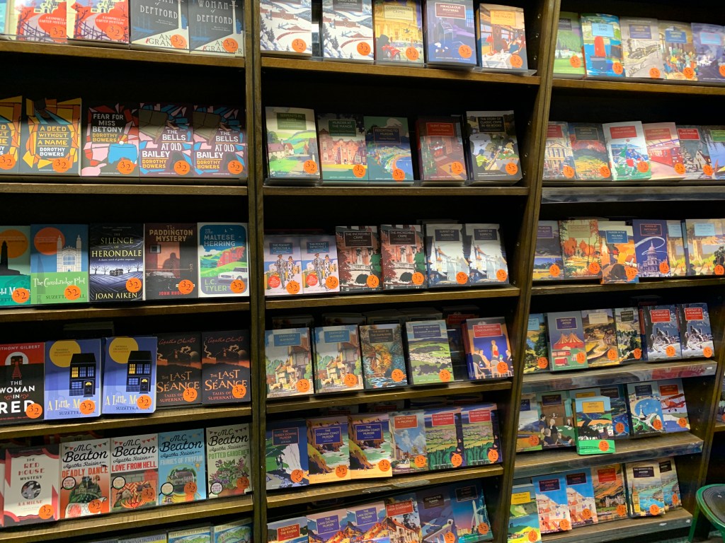 Shelf of British Library Crime Classic books and other mysteries