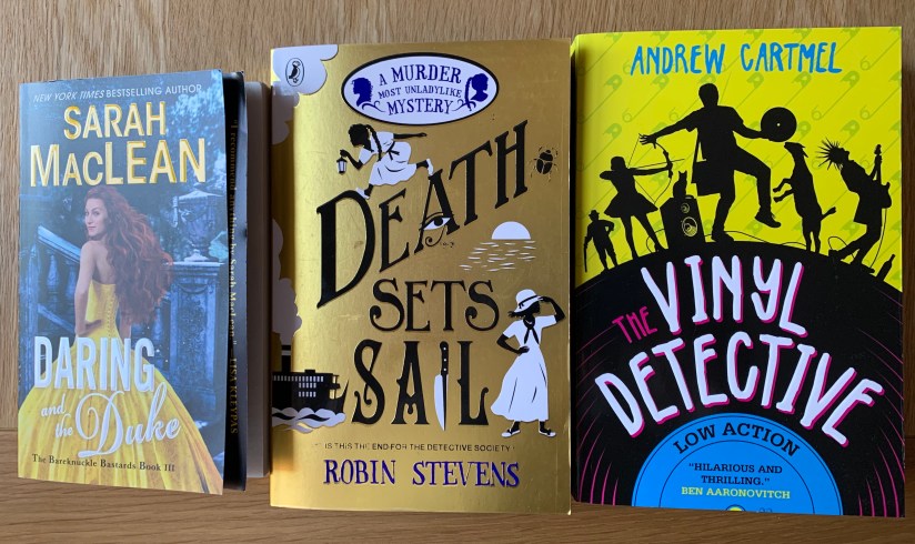 Copies of Daring and the Duke, Death Sets Sail and The Vinyl Detective