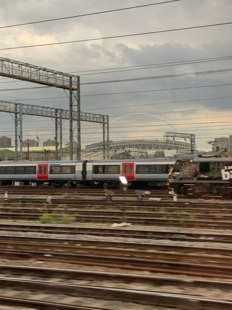 Wembley stadium, as seen in the distance from a train...